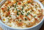 Delicious Joe's Crab Shack crab dip served with chips and fresh herbs
