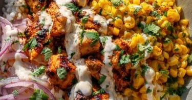 Colorful vibrant rice bowl filled with fresh vegetables and protein