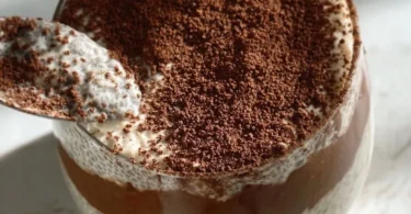 Viral gluten free tiramisu chia pudding in a glass with cocoa topping