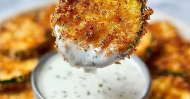 Bowl of crispy air fryer zucchini chips ready to serve
