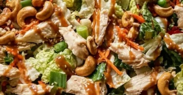 A vibrant Chicken Cashew Crunch Salad with fresh vegetables and crunchy cashews.