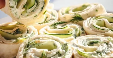 Delicious Cucumber and Dill Pinwheels served on a platter