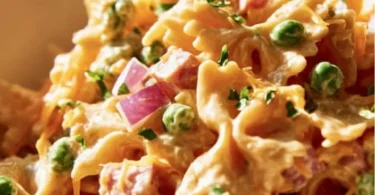 Colorful French Dressing Pasta Salad with vegetables and dressing