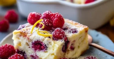 Lemon Raspberry Cottage Cheese Bake with fresh berries and lemon zest