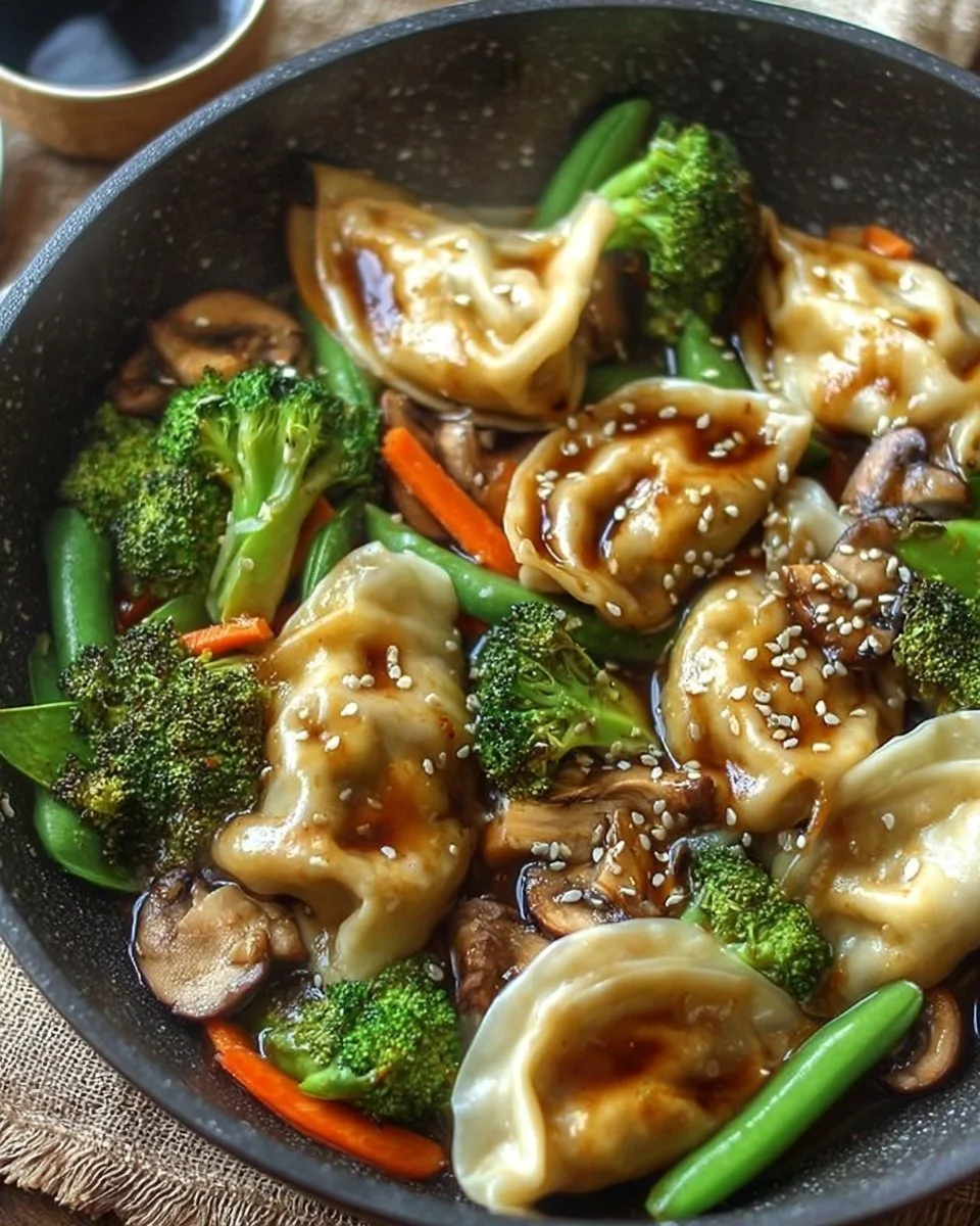 Delicious quick potsticker stir fry with colorful vegetables in a pan.